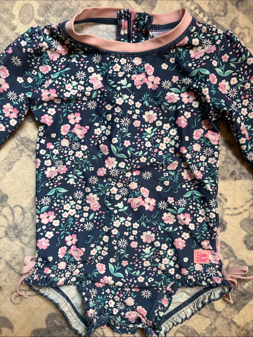 Ruffle Butts Navy Floral One-Piece Swimsuit with Pink Trim